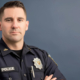 900-ai-generated-enforcing-the-law-confident-police-officer-with-arms-crossed-symbol-of-authority-generative-ai-1