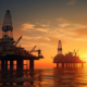 900_medium-oil-drilling-platforms-vessel-and-evening-sky-over-the-sea-located-in-huntington-beach-california-silhouette-concept-1