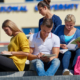 900_medium-vecteezy_students-outside-sitting-on-steps_11919739_medium