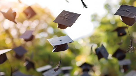 900_medium-vecteezy_graduation-mortarboards-caps-flying-in-the-air-graduation_54403336_medium