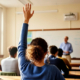 900_large-vecteezy_student-raising-hand-to-ask-question-in-classroom_70424478_large