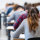 900_large-vecteezy_students-are-engaged-in-taking-an-exam-in-a-modern-classroom_71810193_large