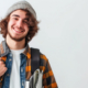 900_medium-vecteezy_ai-generated-portrait-of-smiling-young-college-student-with_38963036_medium-1